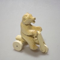 Богородская игрушка "Медведь на велосипеде"
